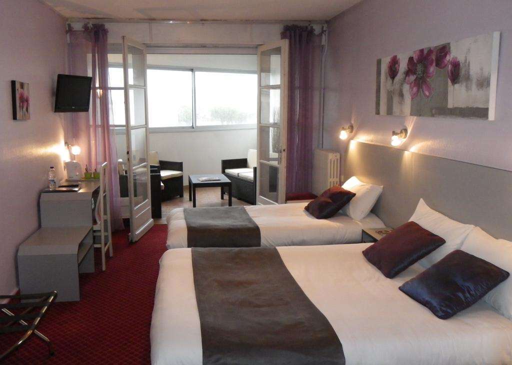Brit Hotel Bleu Nuit Saintes Rum bild